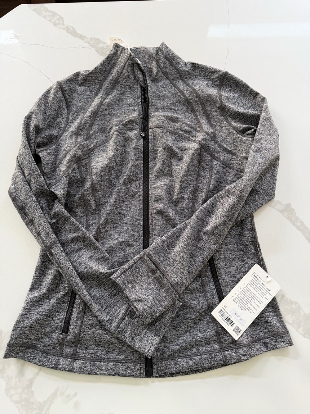 Lululemon Define Jacket in heathered gray color.
